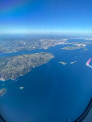 view from plane of coast and islands