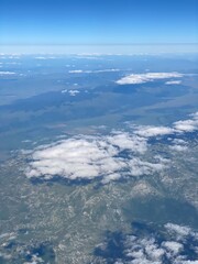 view from plane over europe blue sky