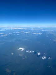 view from plane over europe blue sky