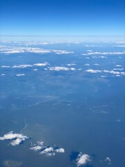 view from plane over europe blue sky