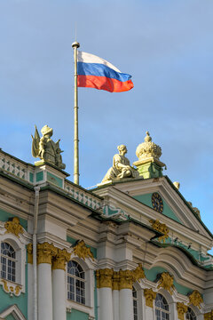 Winter Palace and Russian flag in Saint Petersburg, Russia