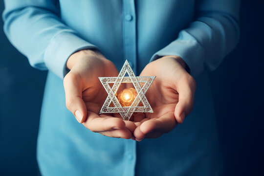 Star of David in the hands of a Jew on a blue background
