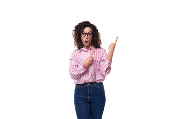 young surprised caucasian woman leader dressed in a striped shirt on the background with copy space