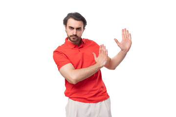Naklejka premium young attractive 35 year old european man with styled haircut and beard explaining his thoughts and ideas