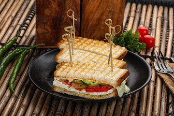Grilled sandwich with cheese and tomato