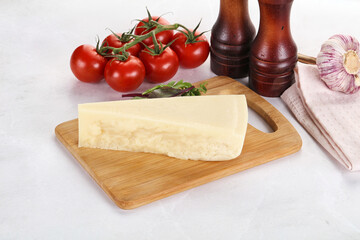 Piece Italian hard parmesan cheese