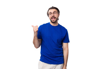 Fototapeta premium young handsome brunette man with beard in blue t-shirt with identity mockup