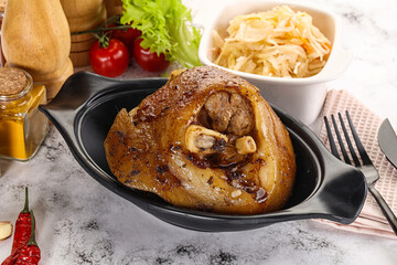 Baked pork knee with spices