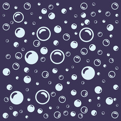 Light blue soap bubbles on a dark purple background.