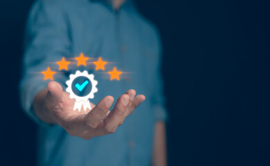 Businessman hand shows sign of top service Quality assurance 5 stars, Guarantee, Standard....
