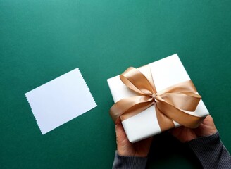 Gift box in woman's hands