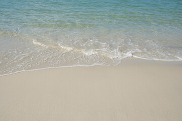 Fototapeta na wymiar The sea is full of water lapping on the beautiful white sand beach.
