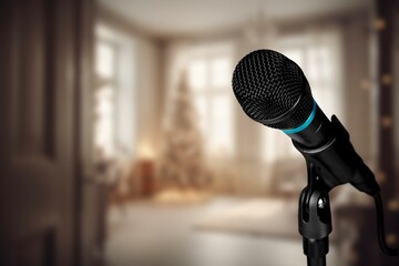 Professional microphone in interior with Christmas ornaments decor