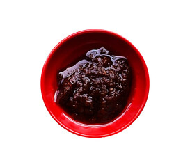 chili sauce in a bowl isolated