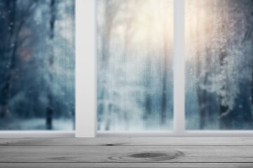 Empty table top on window with snowy landscape background
