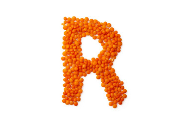 The capital letter 'R' formed from red lentil grains against a clean white backdrop. Perfect for a food blog and menu