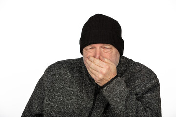Middle-Aged Caucasian Man in Black Winter Hat Freezing on White Background