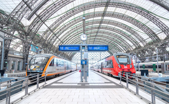 two regional passenger trains waiting for departure on the platform in Dresden hauptbahnhof railway station. Train to Zittau and Leipzig.