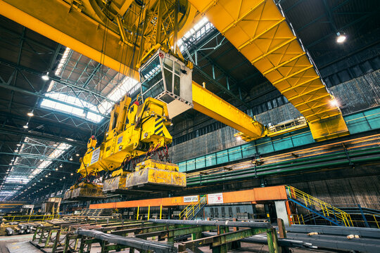 Liberty Ostrava plant - yellow traveling crane in the medium volume rolling mill warehouse