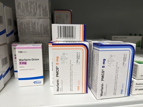 Prague,Czech republic-January 8 2024: box of  WARFARIN PMCS Package of Warfarin Tablets, used to thin blood in patients who are at risk of blood clots which can cause strokes and heart diseases.
