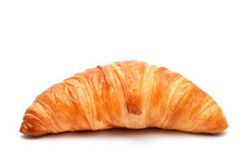 Crispy delicious croissant on a white background, close-up. Homemade baking