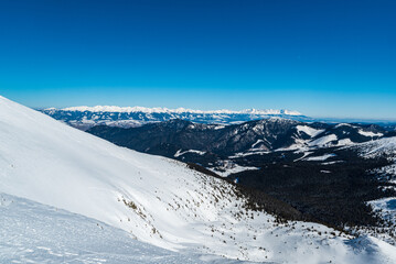 View to Tatra mountains from Polana hill in winter Nizke Tatry mountains in Slovakia © honza28683