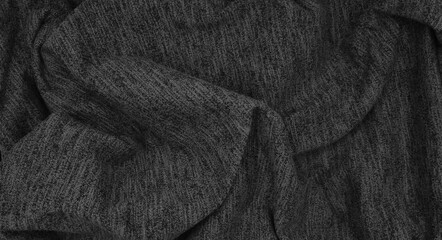 grey black crumpled scarf cotton fabric texture, close up view, use as background. folded canvas...