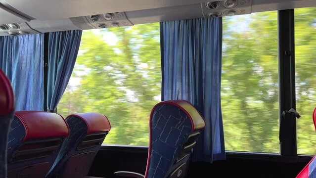 The conductor ticket seller hurries in the bus in Norway, a very fast and convenient means of transportation. 