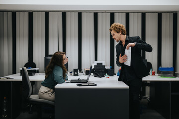 A young couple strategizing and discussing financial planning in an indoor office. They are analyzing market trends and collaborating on profit growth for their small business.