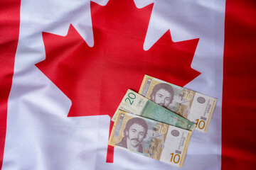 serbian coin on canadian flag