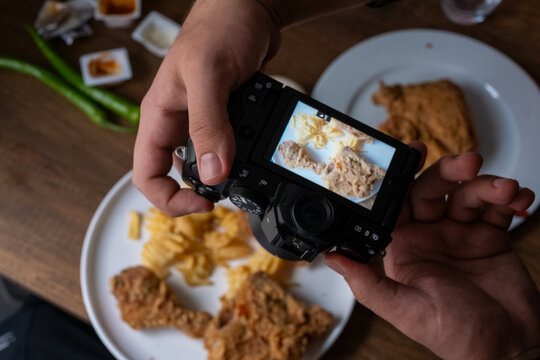 taking photos of fast food chicken