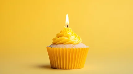 Fotobehang Small yellow colored birthday cake with candle © LELISAT