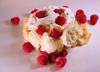waffles with raspberries plate of waffles decorated with chocolat sauce and fresh berries isolated on white background