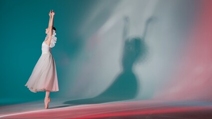 Portrait of female on green background in pink neon light studio. Young ballerina in white tulle...