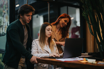 Confident business partners collaborating in a cafe, discussing data analytics and strategies for sustainable growth and increased profitability.
