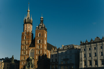 Fototapeta na wymiar Amazing view of Krakov old town in a sunny winter day. Travel destination in Poland.