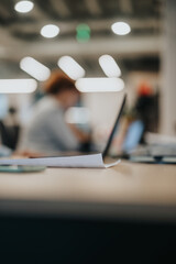 Diverse business professionals discuss financial growth and market analysis, reviewing statistics and planning for sustainable profit growth in a modern office.