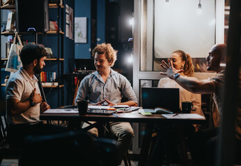 Confident business partners discussing paperwork and project details at a coffee bar. They analyze statistics, plan for profitability, and work together on successful project management.