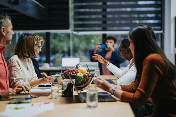 Multinational business team working together to meet project deadline and achieve growth.