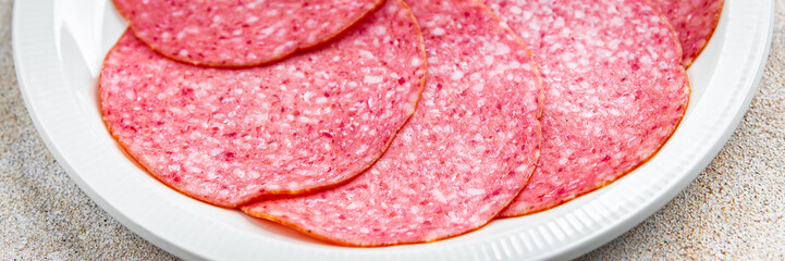 salami sausage meat ready to eat  eating cooking appetizer meal food snack on the table copy space...