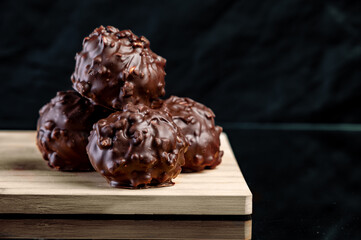Chocolate pralines. Delicious Chocolate and Nuts Balls.  Copy space
