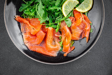 salmon salad fish seafood ready to eat eating cooking appetizer meal food snack on the table copy space food background rustic top view  diet Pescetarian
