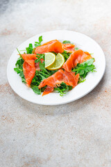 salmon salad fish seafood ready to eat eating cooking appetizer meal food snack on the table copy space food background rustic top view  diet Pescetarian