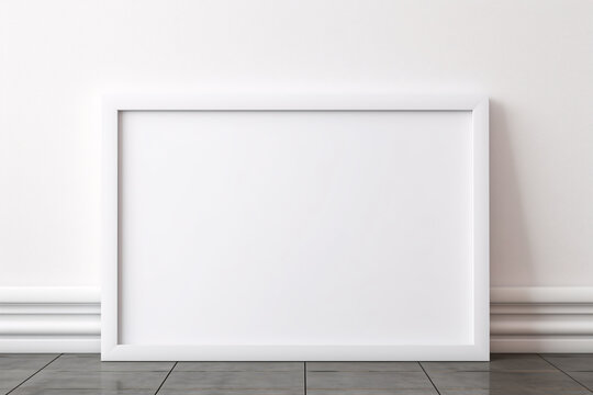 White empty frame against a white wall, picture frame mockup