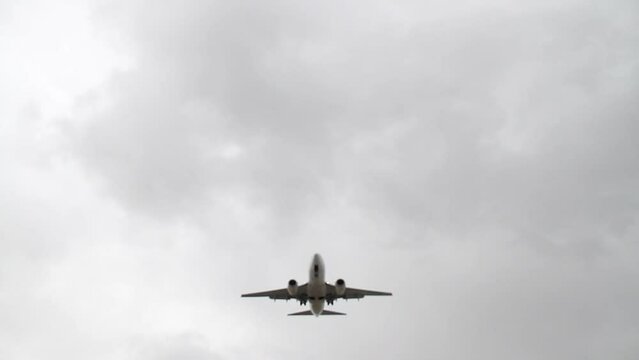 San Diego Airplane Landing Overhead Static Cloudy