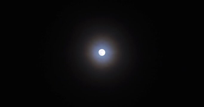 Astrovideography of lunar halo - a circular rainbow forming around the moon, real time shot speed