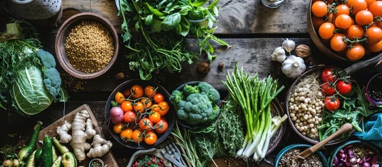 Zelfklevend Fotobehang Ethical eating with plant-based vegan food consisting of vegetables, fruits, grains, legumes, and nuts  rich in protein, antioxidants, vitamins, and fiber. © AkuAku