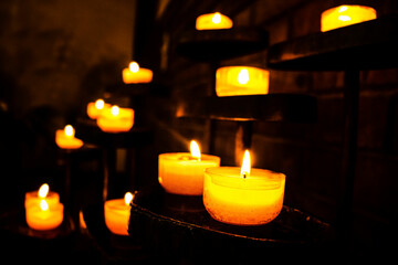 candles burning in the dark, burning candles in the church