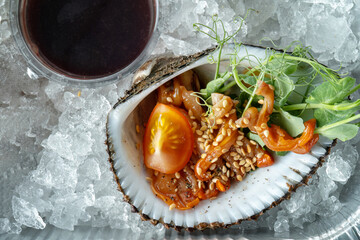 Raw uncooked clams shells shellfish , laid out on ice. Clouse-up