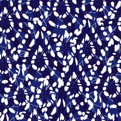 Vector blue and white shibori abstract teardrop overlap patten. Suitable for textile, gift wrap and wallpaper.
